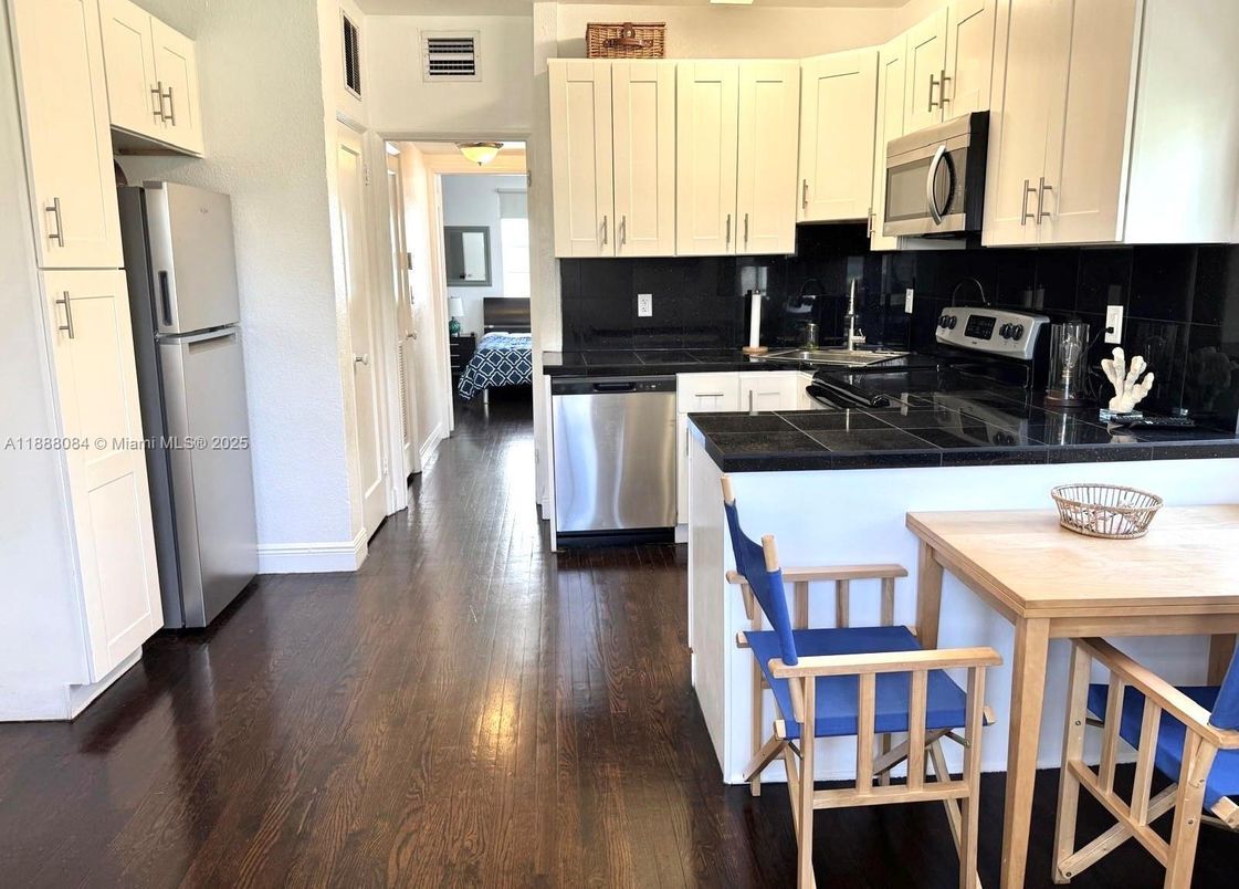 Interior, Kitchen, Tile Countertops, Wood Texture Flooring