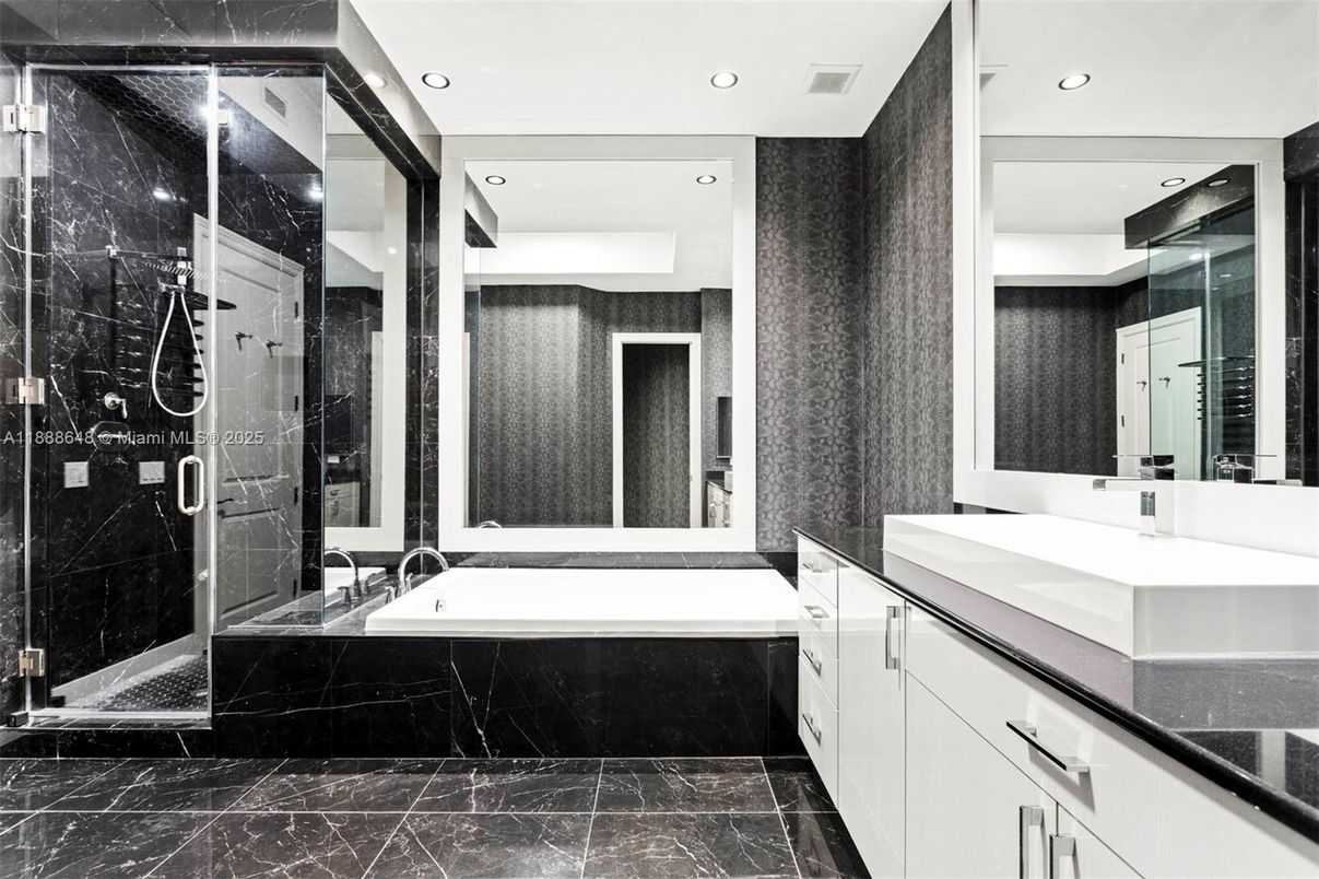 Bathroom, Dual Sink Vanities, Glass Shower, Interior, Marble, Marble Walls, Recessed Lighting