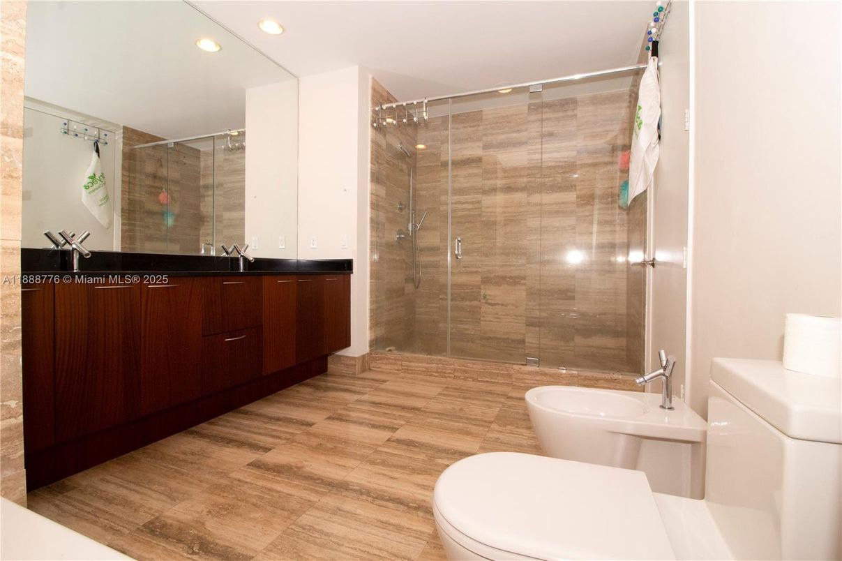 Bathroom, Dual Sink Vanities, Glass Shower, Interior, Recessed Lighting, Wood Texture Flooring