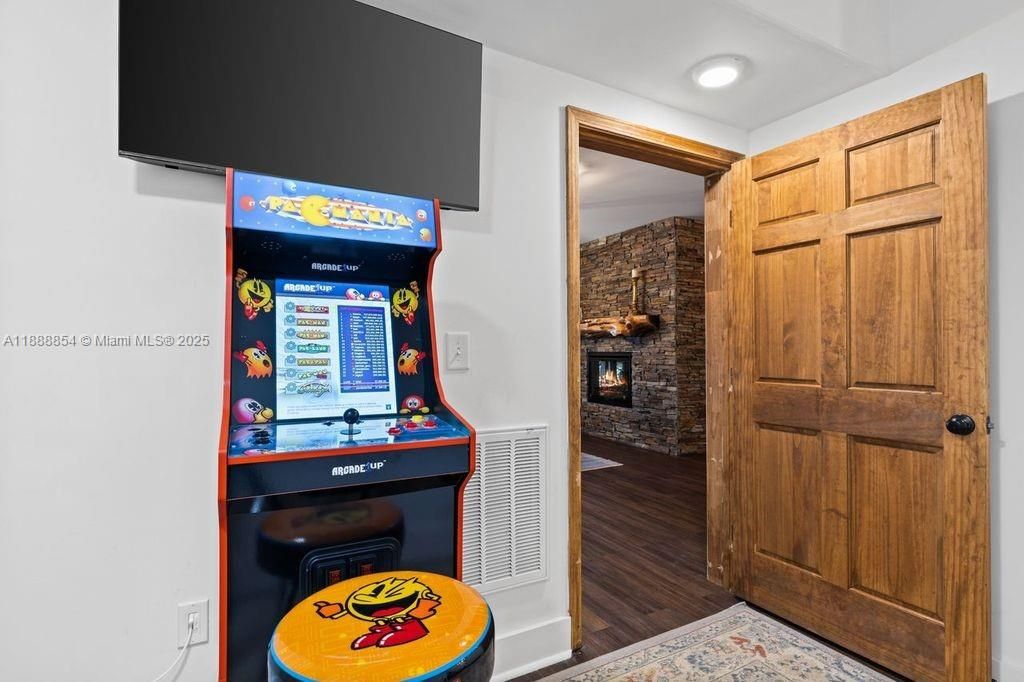 Fireplace, Interior, Recessed Lighting, Stone Walls, Wood Texture Flooring