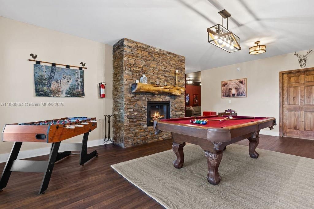 Billiard Table, Fireplace, Game Room, Interior, Pendant Lights, Wood Texture Flooring
