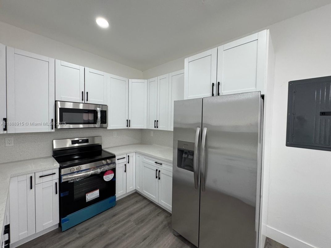 Interior, Kitchen, Recessed Lighting, Stainless Steel Appliances, Wood Texture Flooring