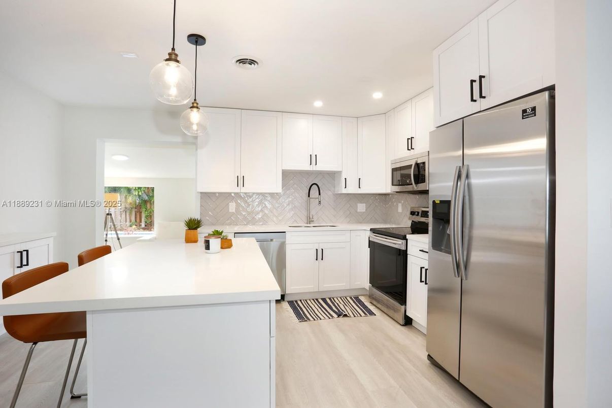 Interior, Kitchen, Pendant Lights, Recessed Lighting, Stainless Steel Appliances, Wood Texture Flooring