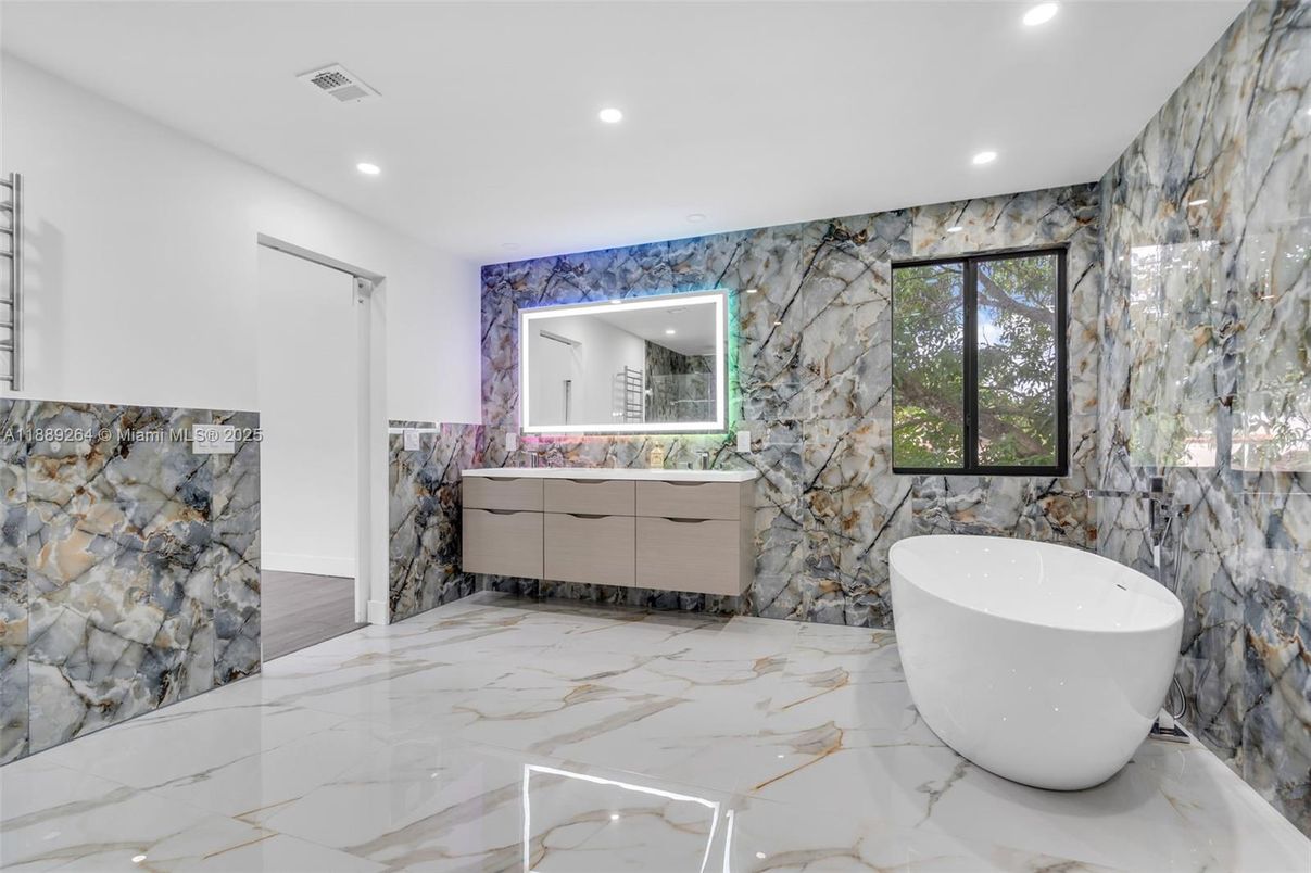 Bathroom, Dual Sink Vanities, Free Standing Baths, Interior, Marble, Marble Walls, Recessed Lighting