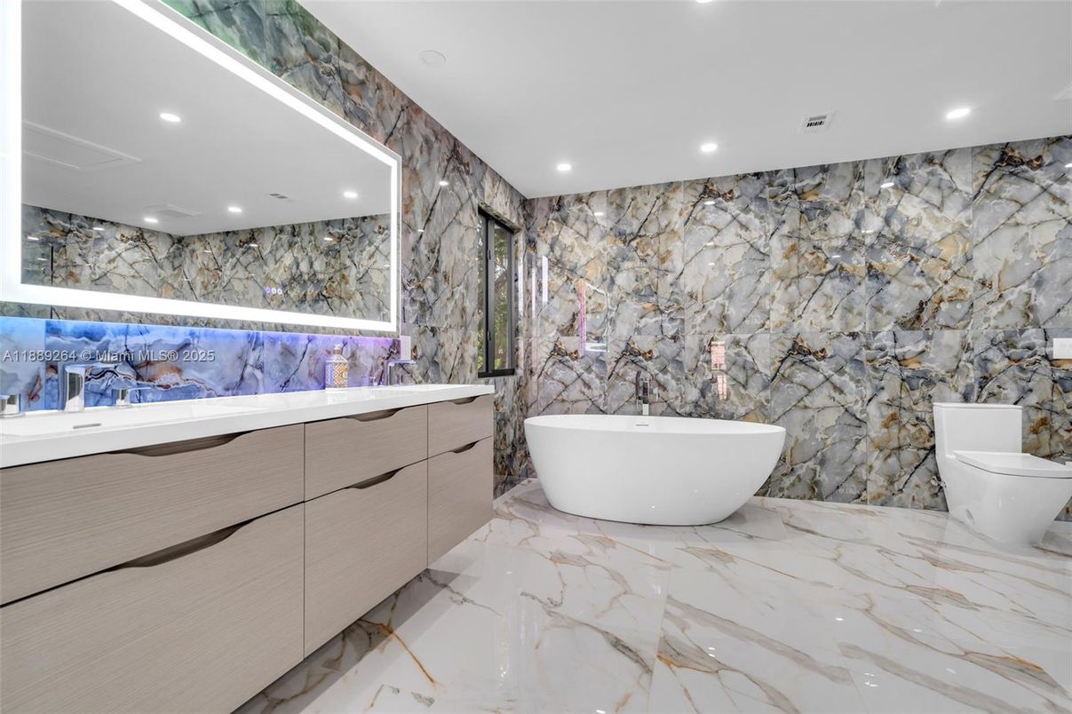 Bathroom, Dual Sink Vanities, Free Standing Baths, Interior, Marble, Marble Walls, Recessed Lighting