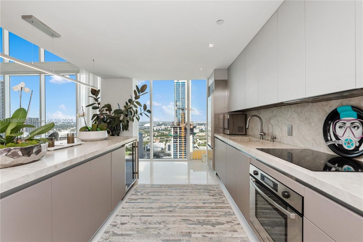 Interior, Kitchen, Recessed Lighting, Stainless Steel Appliances, Water, Wood Texture Flooring