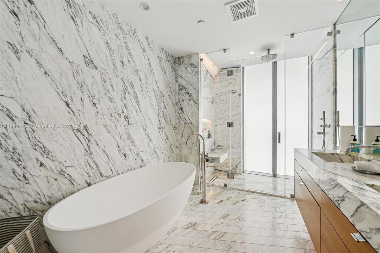 Bathroom, Free Standing Baths, Glass Shower, Interior, Marble, Marble Walls, Recessed Lighting