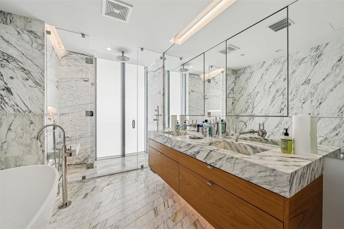 Bathroom, Dual Sink Vanities, Glass Shower, Interior, Marble, Marble Walls, Recessed Lighting