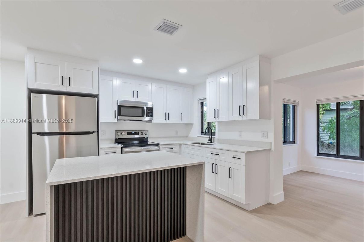 Interior, Kitchen, Recessed Lighting, Stainless Steel Appliances, Wood Texture Flooring