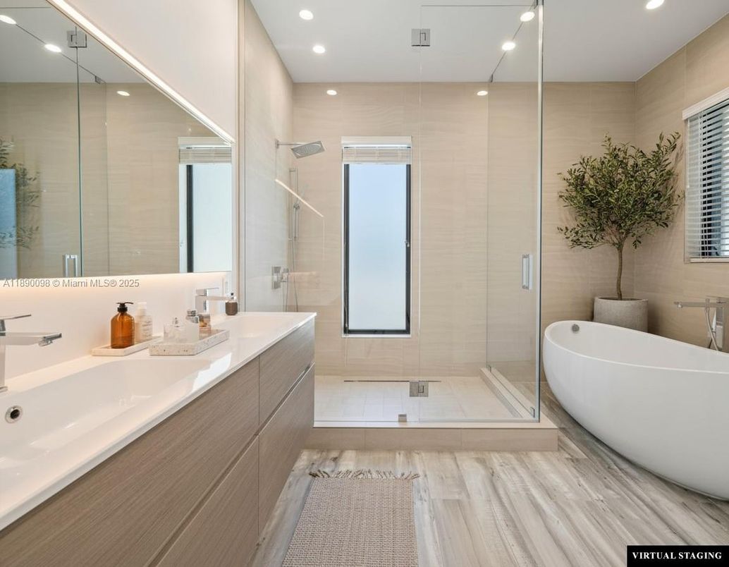 Bathroom, Dual Sink Vanities, Free Standing Baths, Glass Shower, Interior, Recessed Lighting, Wood Texture Flooring
