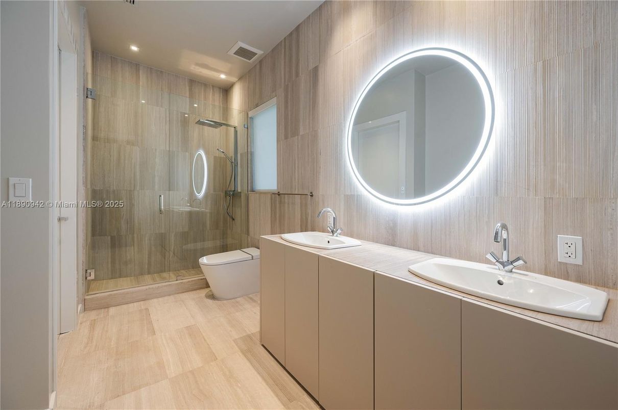 Bathroom, Dual Sink Vanities, Glass Shower, Interior, Recessed Lighting, Wood Texture Flooring