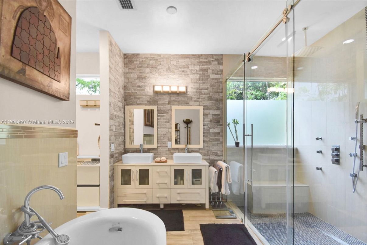 Bathroom, Dual Sink Vanities, Free Standing Baths, Glass Shower, Interior, Recessed Lighting, Stone Walls