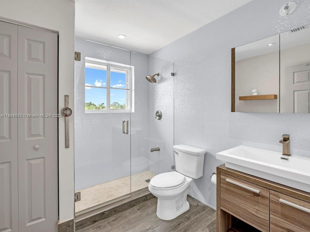 Bathroom, Glass Shower, Interior, Recessed Lighting, Wood Texture Flooring
