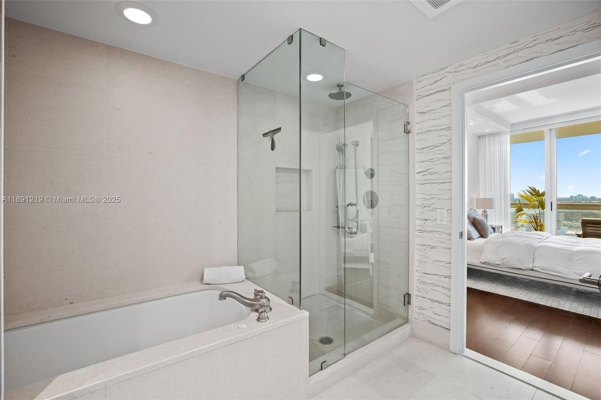 Bathroom, Bedroom, Glass Shower, Interior, Recessed Lighting, Water, Wood Texture Flooring