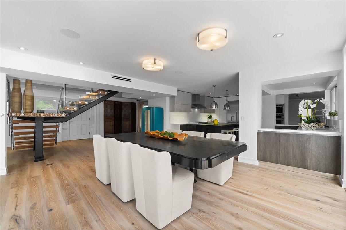 Dining room, Interior, Kitchen, Pendant Lights, Recessed Lighting, Stainless Steel Appliances, Wood Texture Flooring