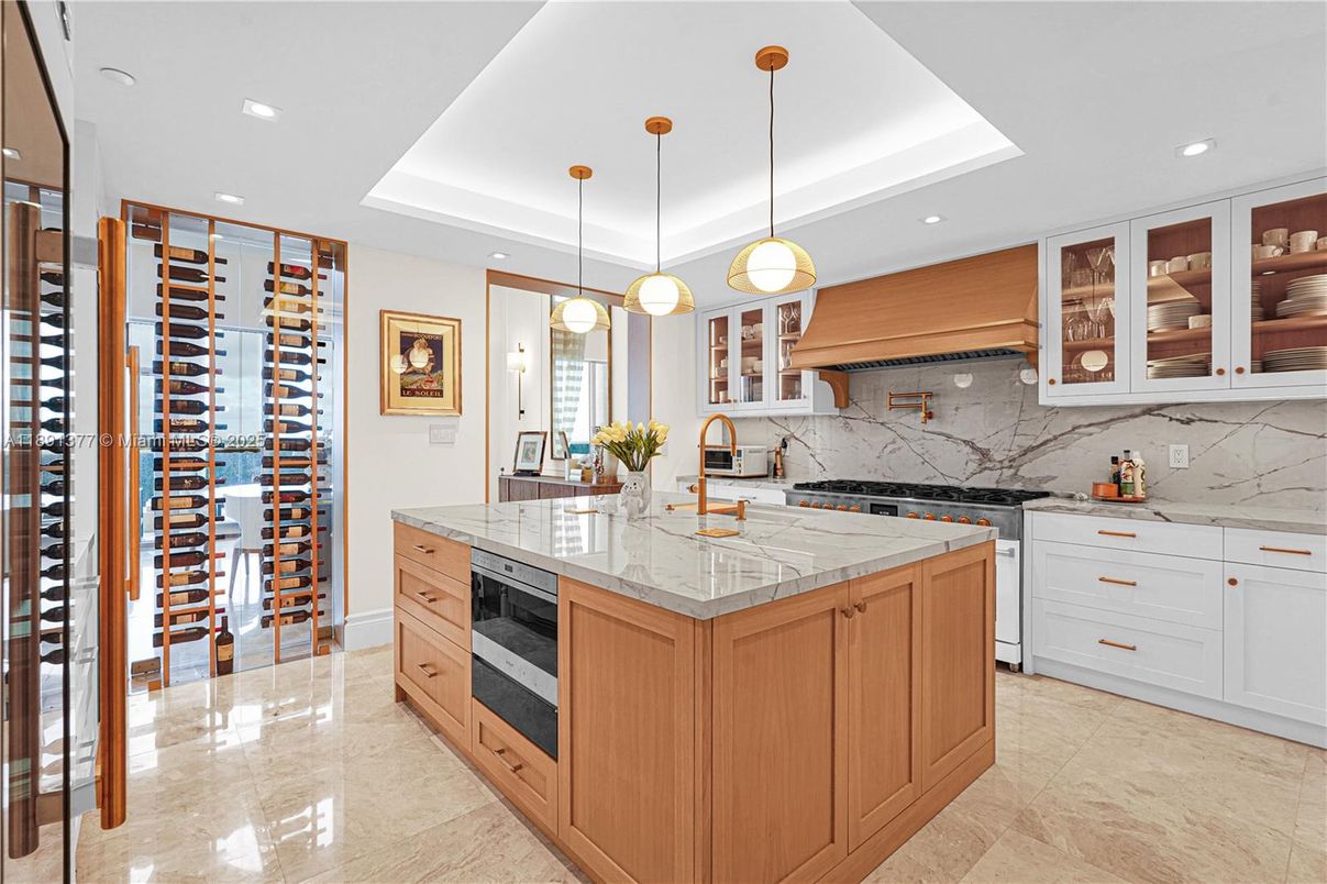 Interior, Kitchen, Marble Walls, Pendant Lights, Recessed Lighting, Stainless Steel Appliances