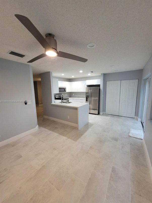 Empty room, Interior, Kitchen, Recessed Lighting, Stainless Steel Appliances