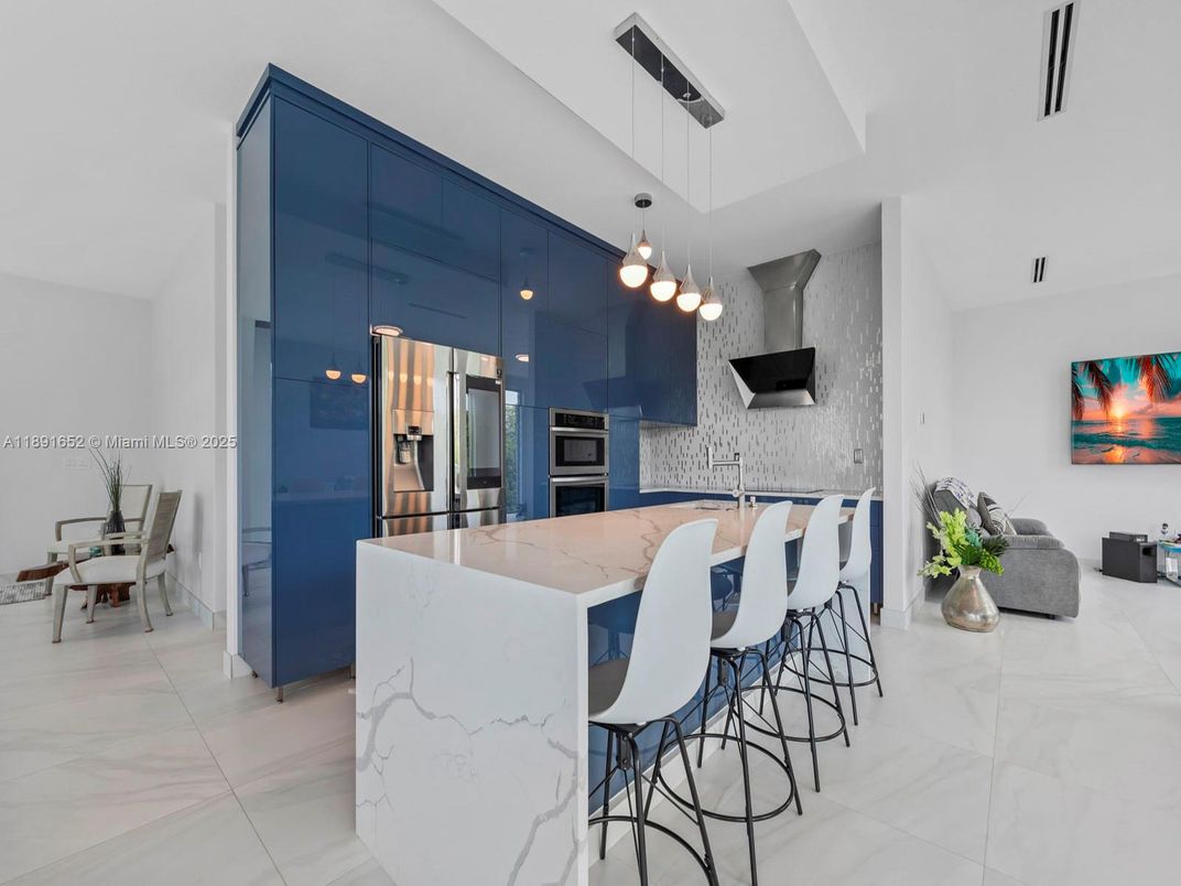 Dining room, Interior, Kitchen, Marble, Pendant Lights, Stainless Steel Appliances