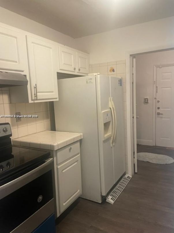 Interior, Kitchen, Tile Countertops, Wood Texture Flooring