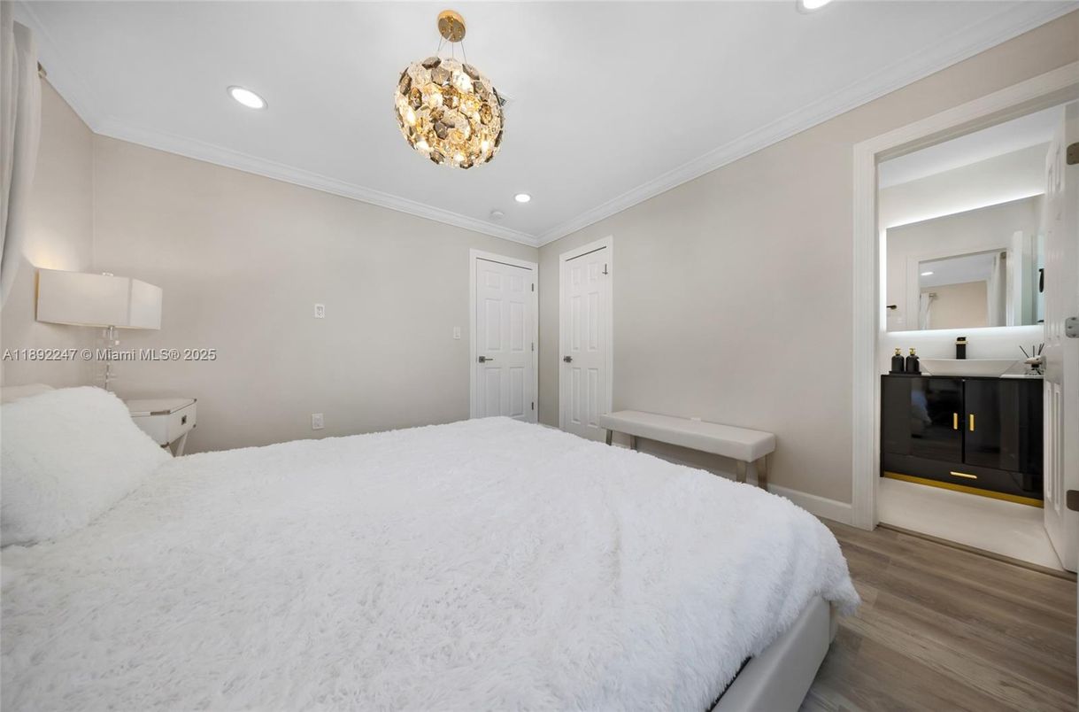 Bedroom, Chandelier, Fireplace, Interior, Pendant Lights, Recessed Lighting, Wood Texture Flooring