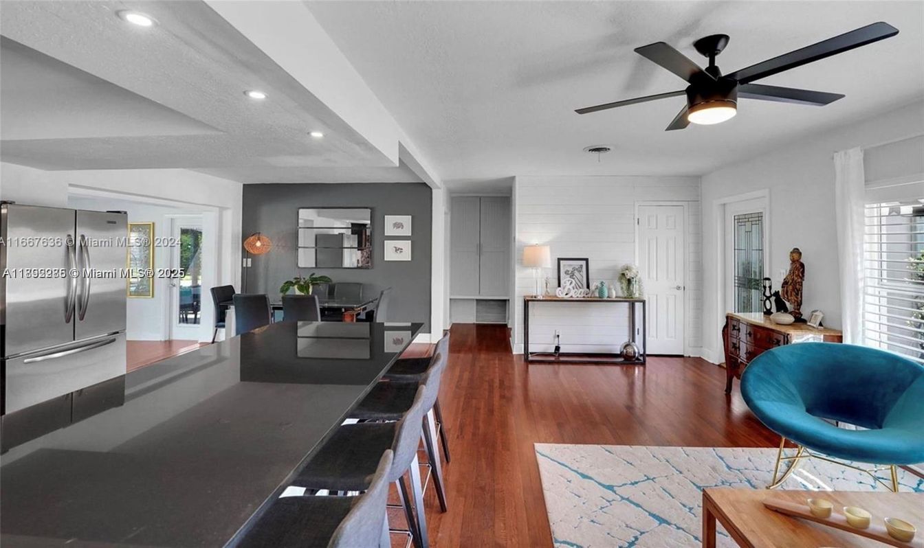 Dining room, Interior, Kitchen, Living room, Recessed Lighting, Stainless Steel Appliances, Wood Texture Flooring