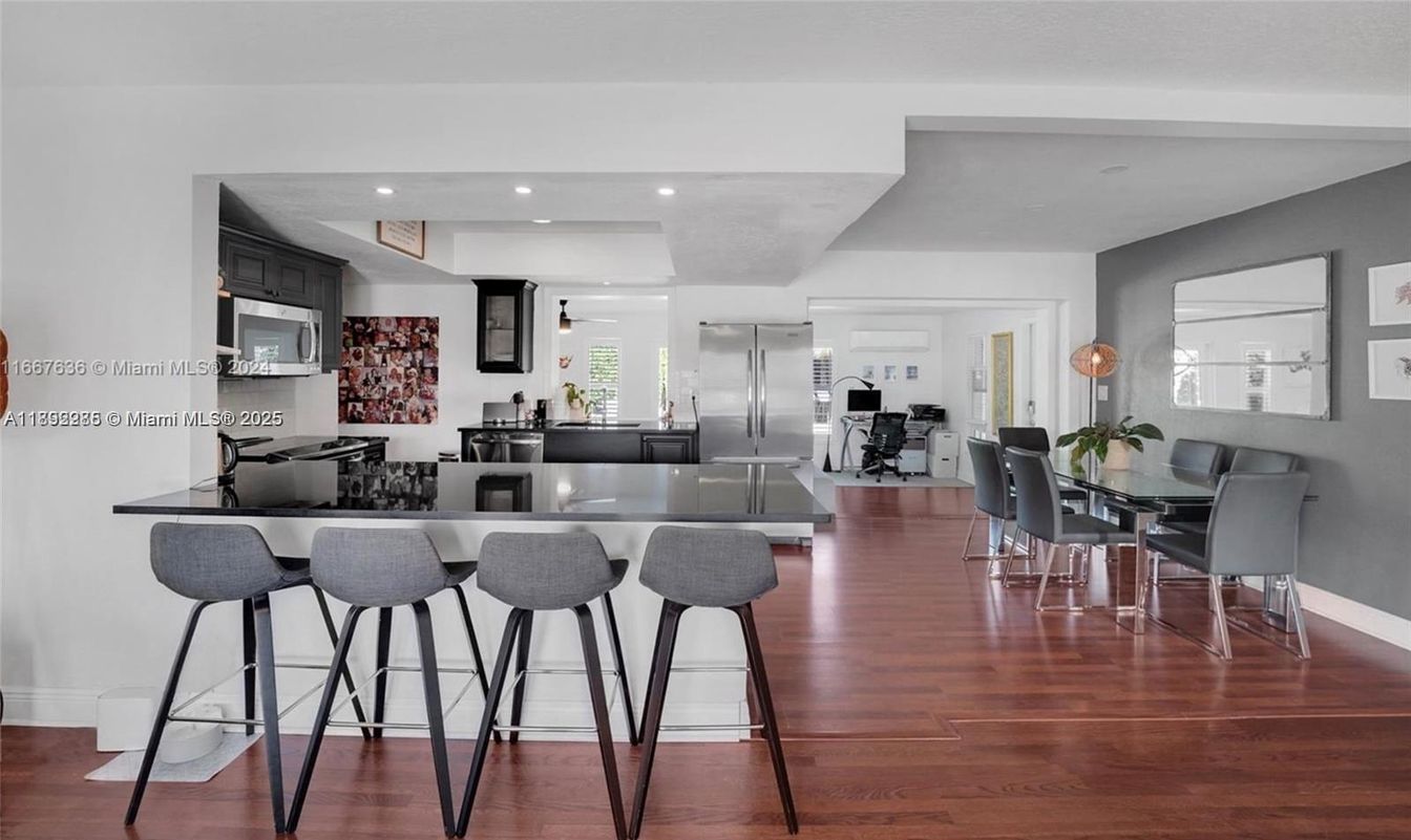 Dining room, Interior, Kitchen, Living room, Recessed Lighting, Stainless Steel Appliances, Wood Texture Flooring