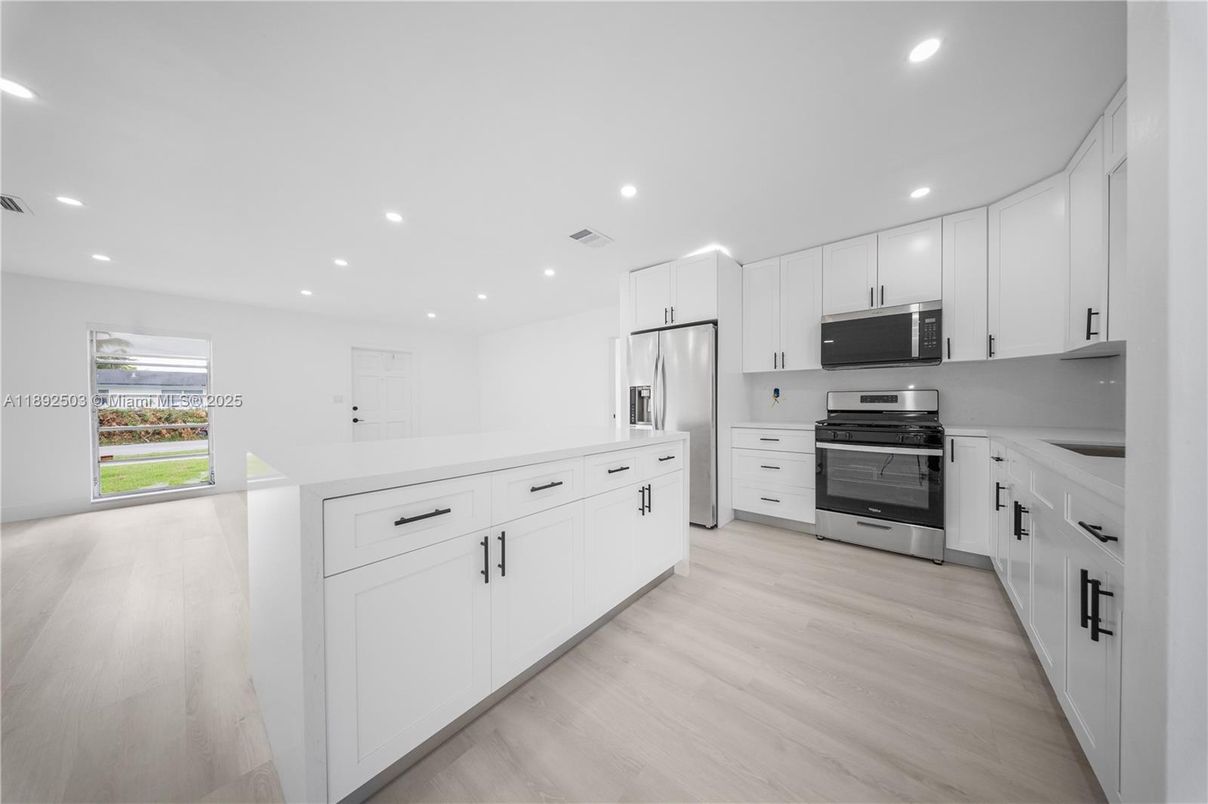 Interior, Kitchen, Recessed Lighting, Stainless Steel Appliances, Wood Texture Flooring