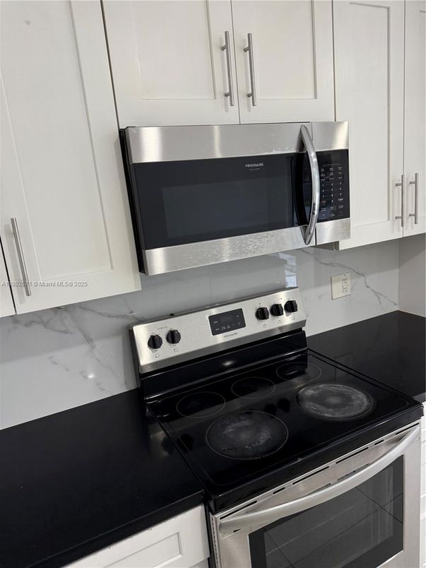 Interior, Kitchen, Marble Walls, Stainless Steel Appliances