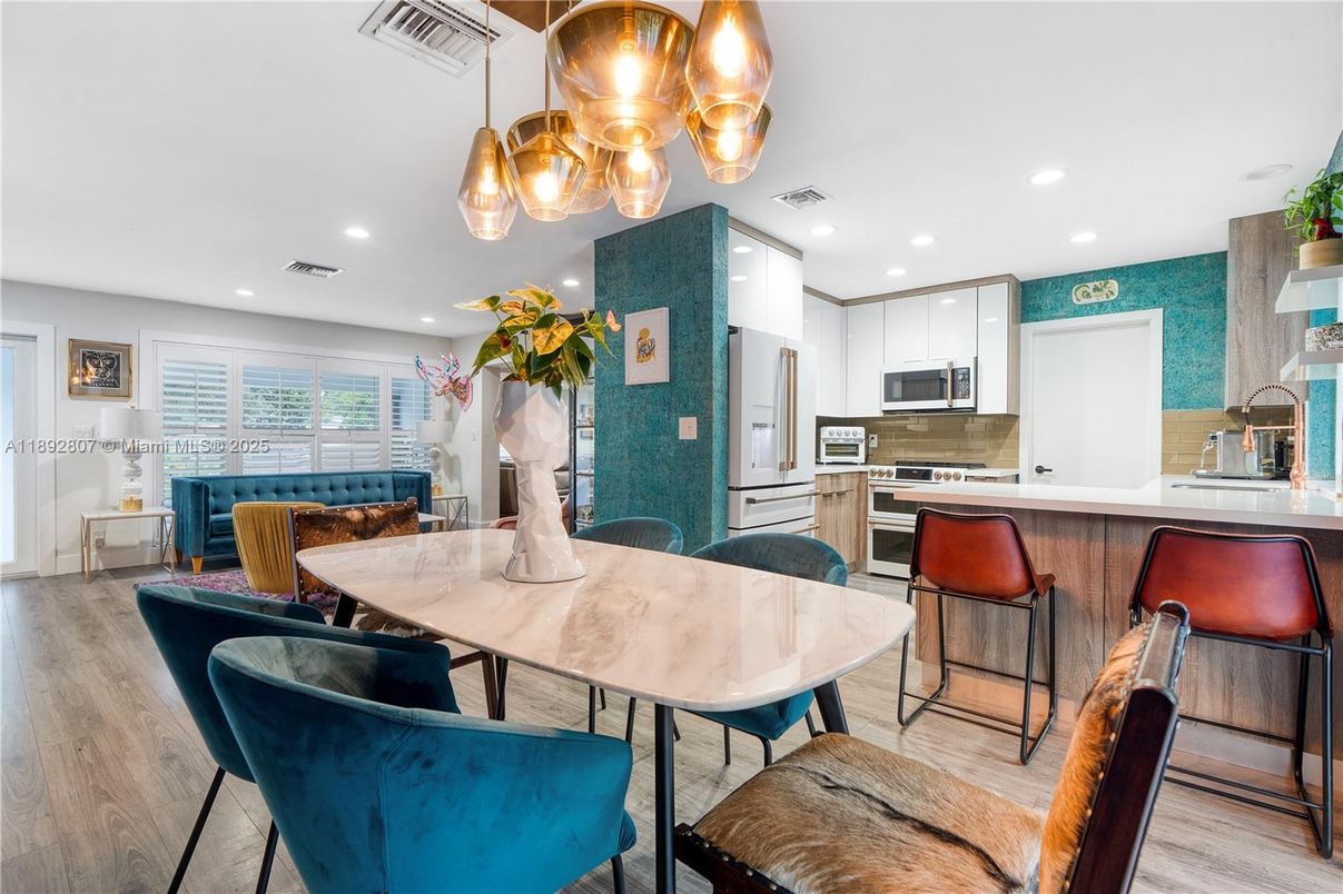 Dining room, Interior, Kitchen, Living room, Recessed Lighting, Stainless Steel Appliances, Wood Texture Flooring
