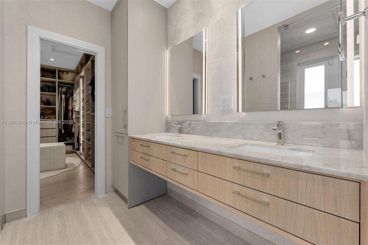 Bathroom, Dual Sink Vanities, Interior, Recessed Lighting, Walk-in Closets, Wood Texture Flooring