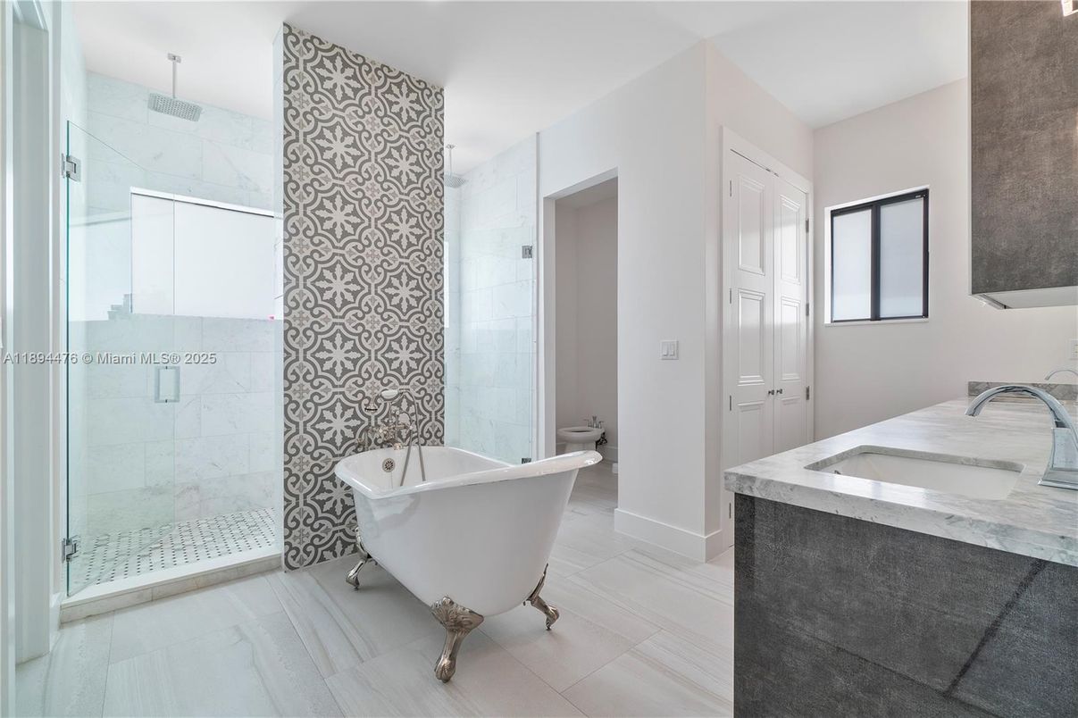 Bathroom, Dual Sink Vanities, Free Standing Baths, Glass Shower, Interior, Marble Walls