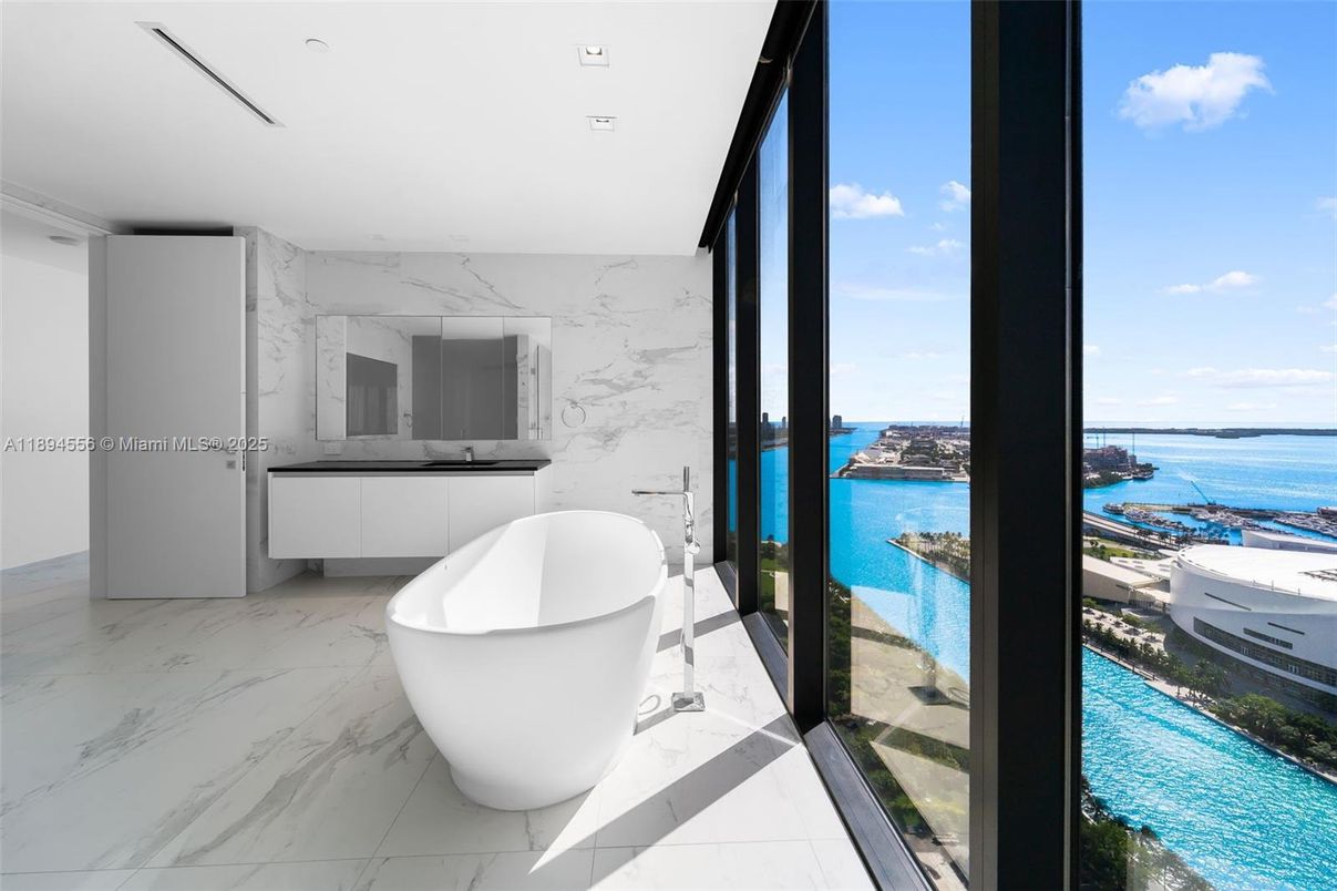 Bathroom, Free Standing Baths, Interior, Marble, Marble Walls, Recessed Lighting, Water