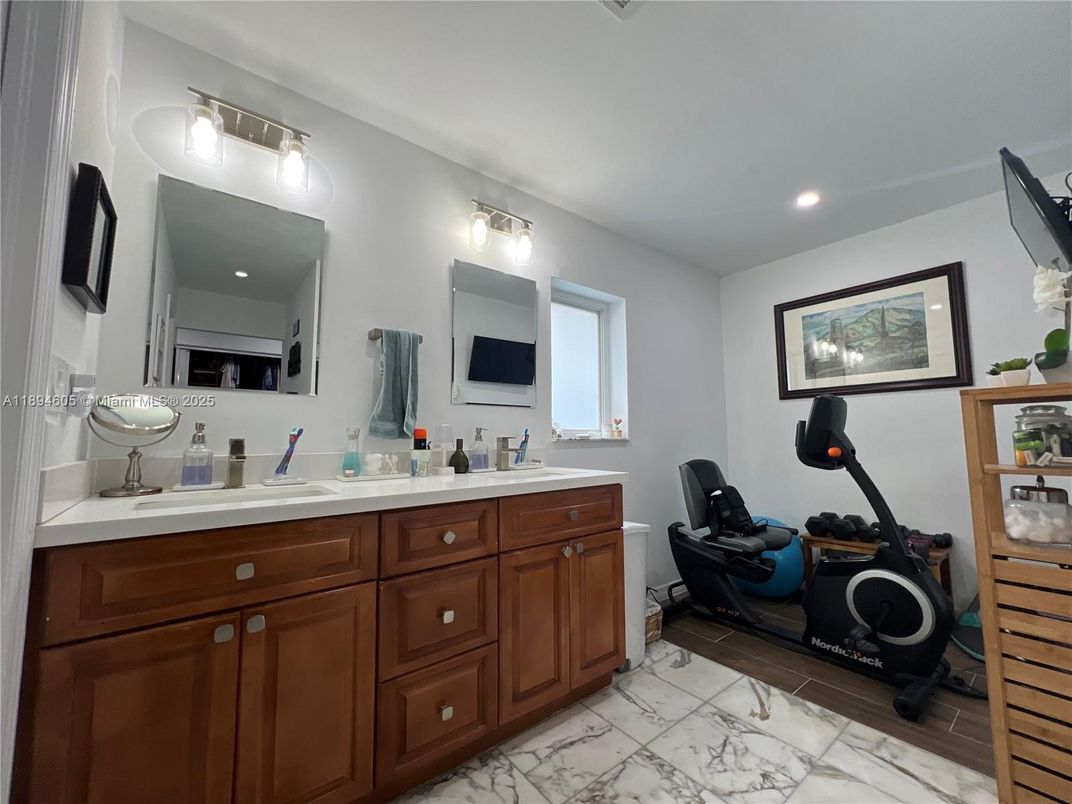 Bathroom, Dual Sink Vanities, Fitness Equipment, Interior, Marble, Recessed Lighting