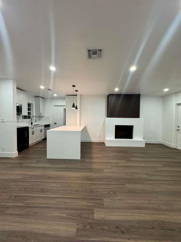 Fireplace, Interior, Kitchen, Pendant Lights, Recessed Lighting, Wood Texture Flooring