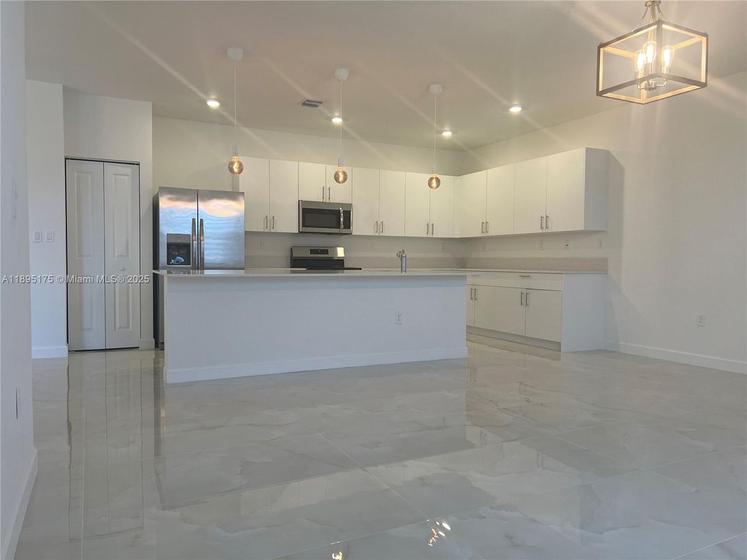 Interior, Kitchen, Marble, Pendant Lights, Recessed Lighting, Stainless Steel Appliances