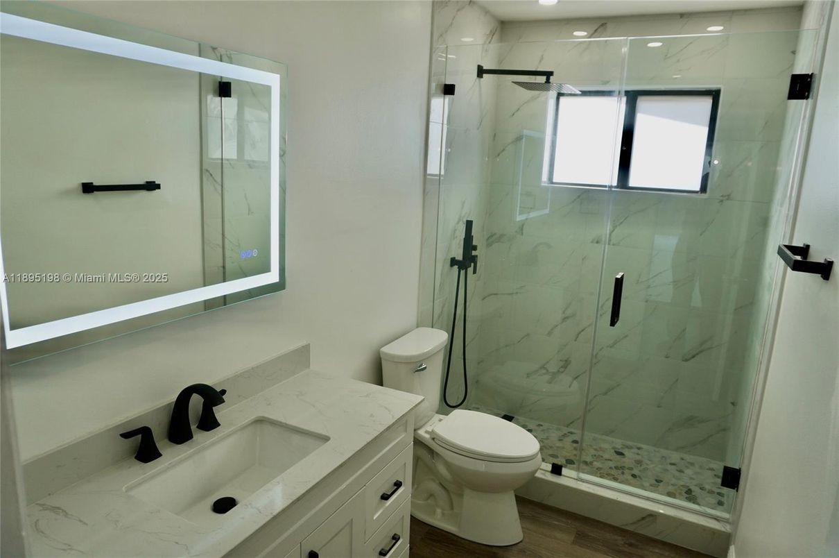 Bathroom, Glass Shower, Interior, Marble Walls, Recessed Lighting, Wood Texture Flooring