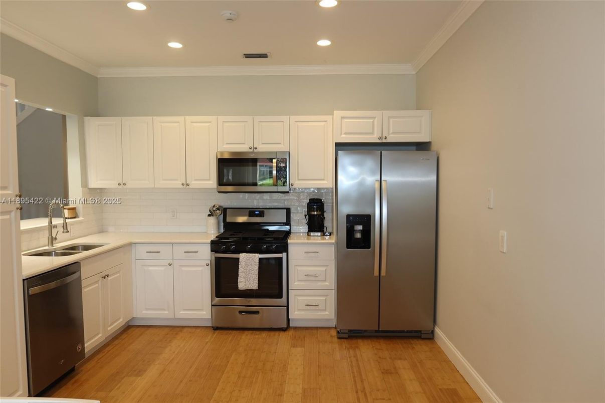 Interior, Kitchen, Recessed Lighting, Stainless Steel Appliances, Wood Texture Flooring