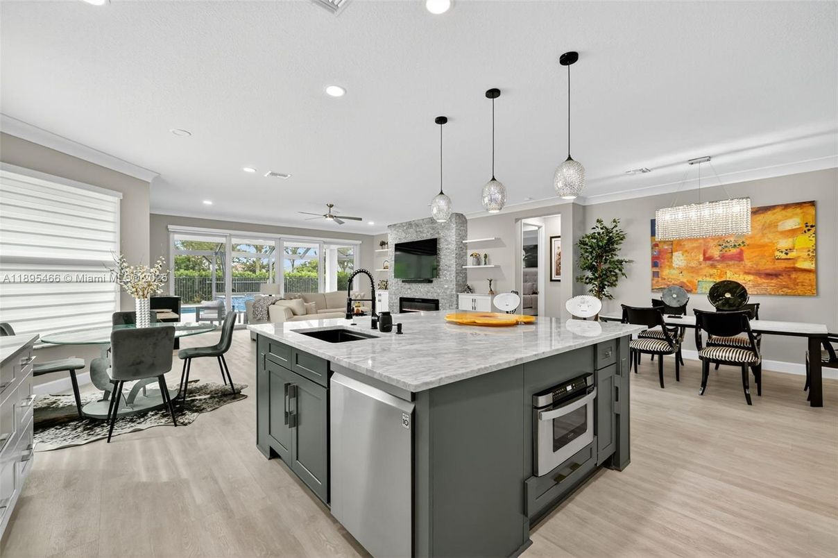 Dining room, Fireplace, Interior, Kitchen, Pendant Lights, Recessed Lighting, Wood Texture Flooring