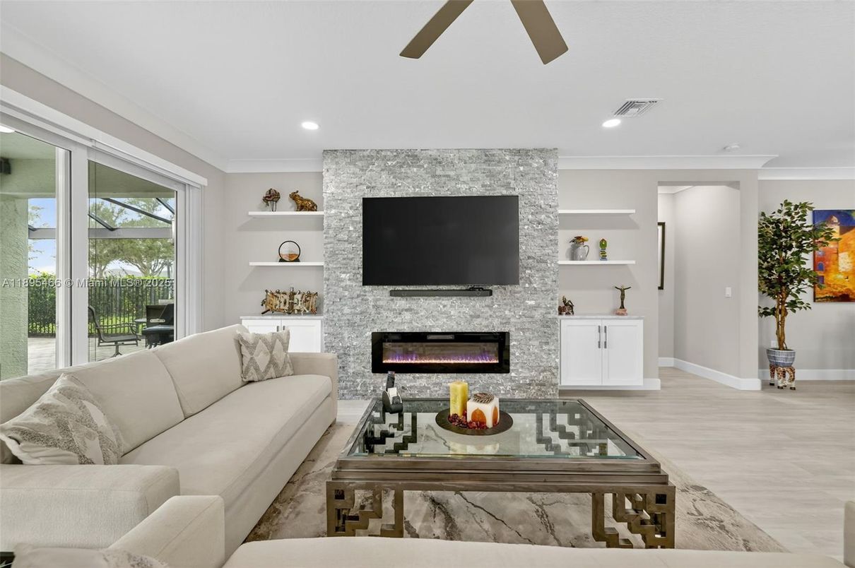 Fireplace, Interior, Living room, Recessed Lighting, Stone Walls, Wood Texture Flooring