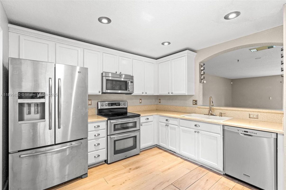 Interior, Kitchen, Recessed Lighting, Stainless Steel Appliances, Wood Texture Flooring