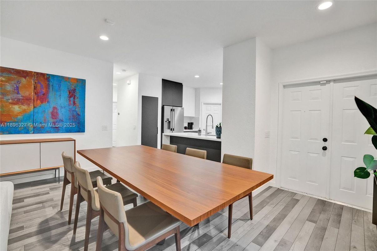 Dining room, Interior, Kitchen, Recessed Lighting, Stainless Steel Appliances, Wood Texture Flooring