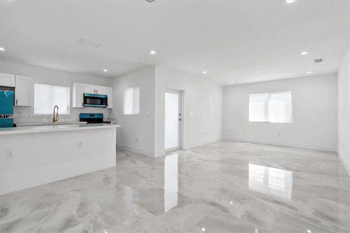 Empty room, Interior, Kitchen, Marble, Recessed Lighting, Stainless Steel Appliances