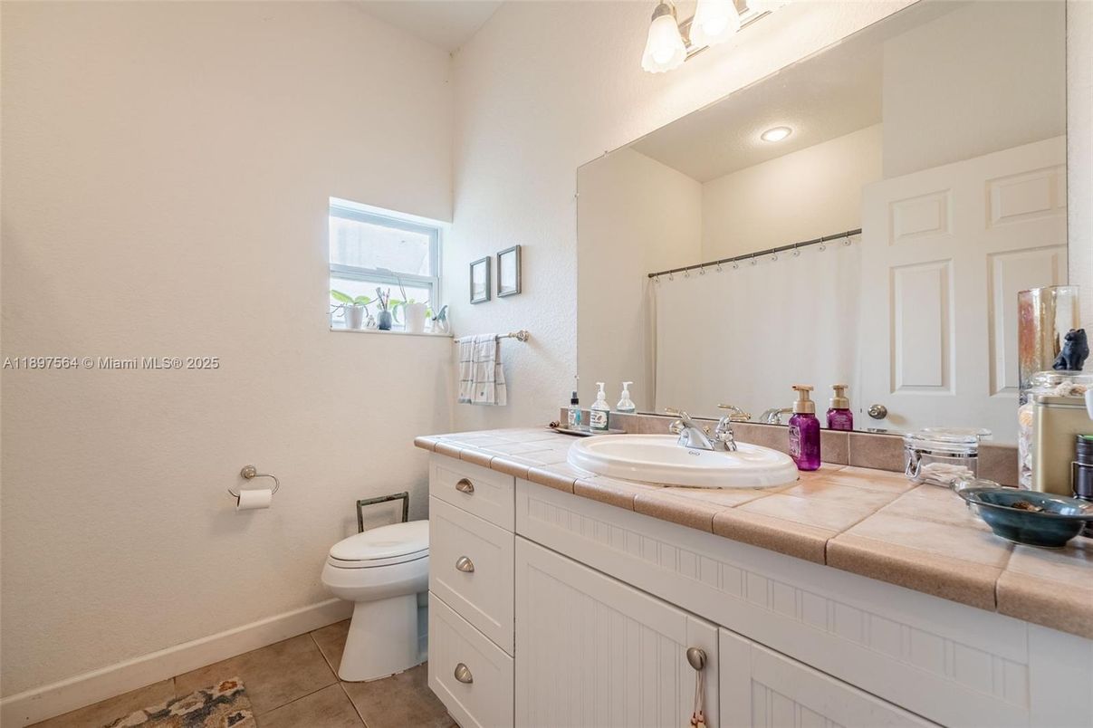 Bathroom, Dual Sink Vanities, Interior, Recessed Lighting, Tile Countertops