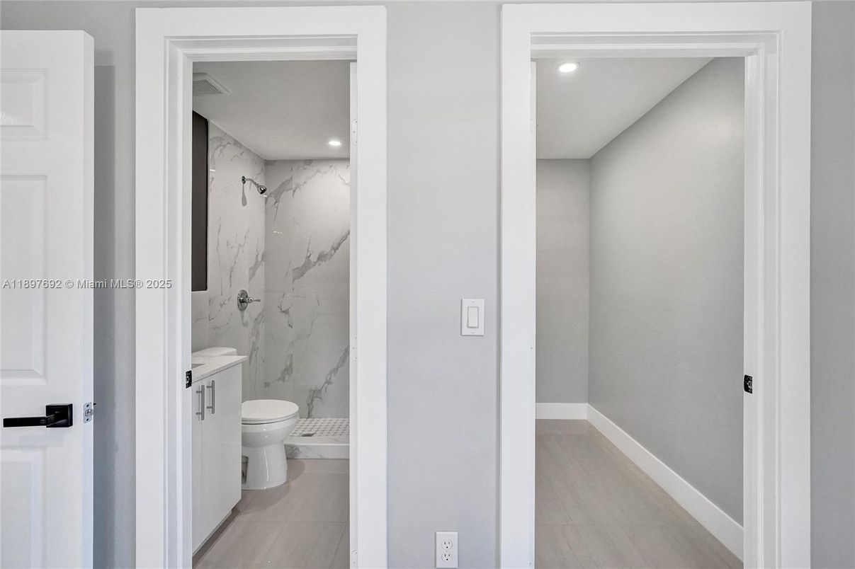 Bathroom, Interior, Marble Walls, Recessed Lighting, Wood Texture Flooring