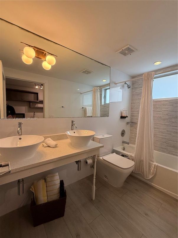 Bathroom, Dual Sink Vanities, Interior, Recessed Lighting, Wood Texture Flooring