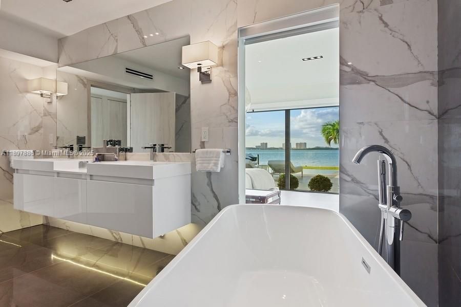 Bathroom, Free Standing Baths, Interior, Marble Walls, Recessed Lighting, Water
