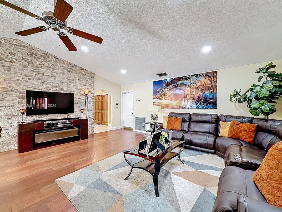 Interior, Living room, Recessed Lighting, Stone Walls, Wood Texture Flooring