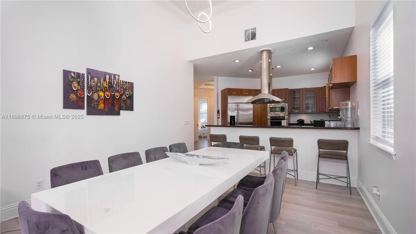 Dining room, Interior, Kitchen, Recessed Lighting, Stainless Steel Appliances, Wood Texture Flooring
