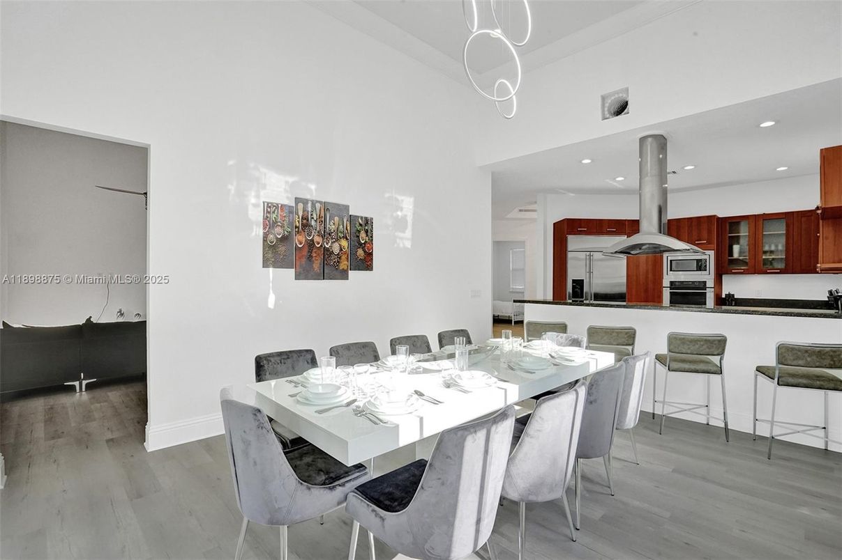 Dining room, Interior, Kitchen, Recessed Lighting, Stainless Steel Appliances, Wood Texture Flooring