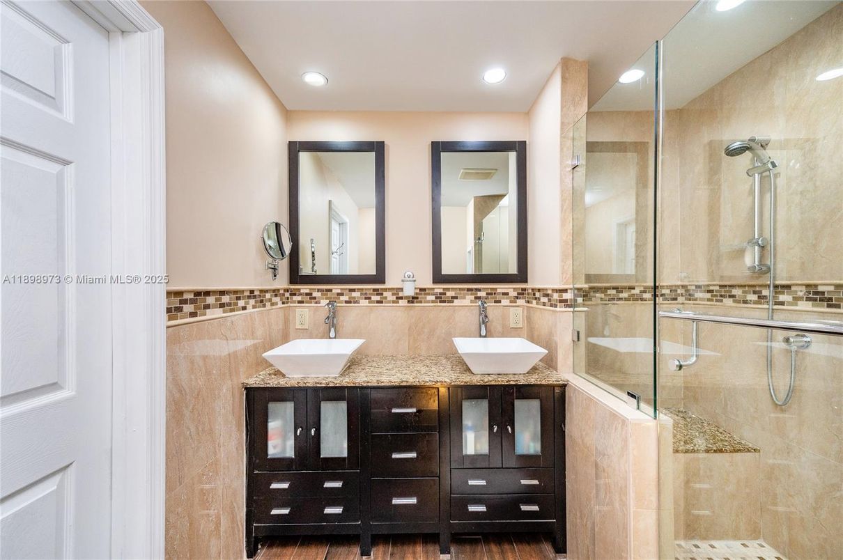 Bathroom, Dual Sink Vanities, Glass Shower, Interior, Recessed Lighting, Wood Texture Flooring